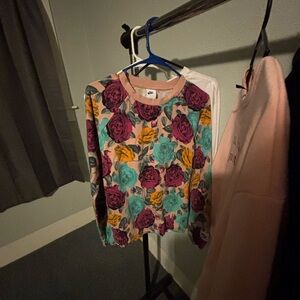 Nike Floral Crewneck Sweatshirt in Pink, Teal, and Mustard